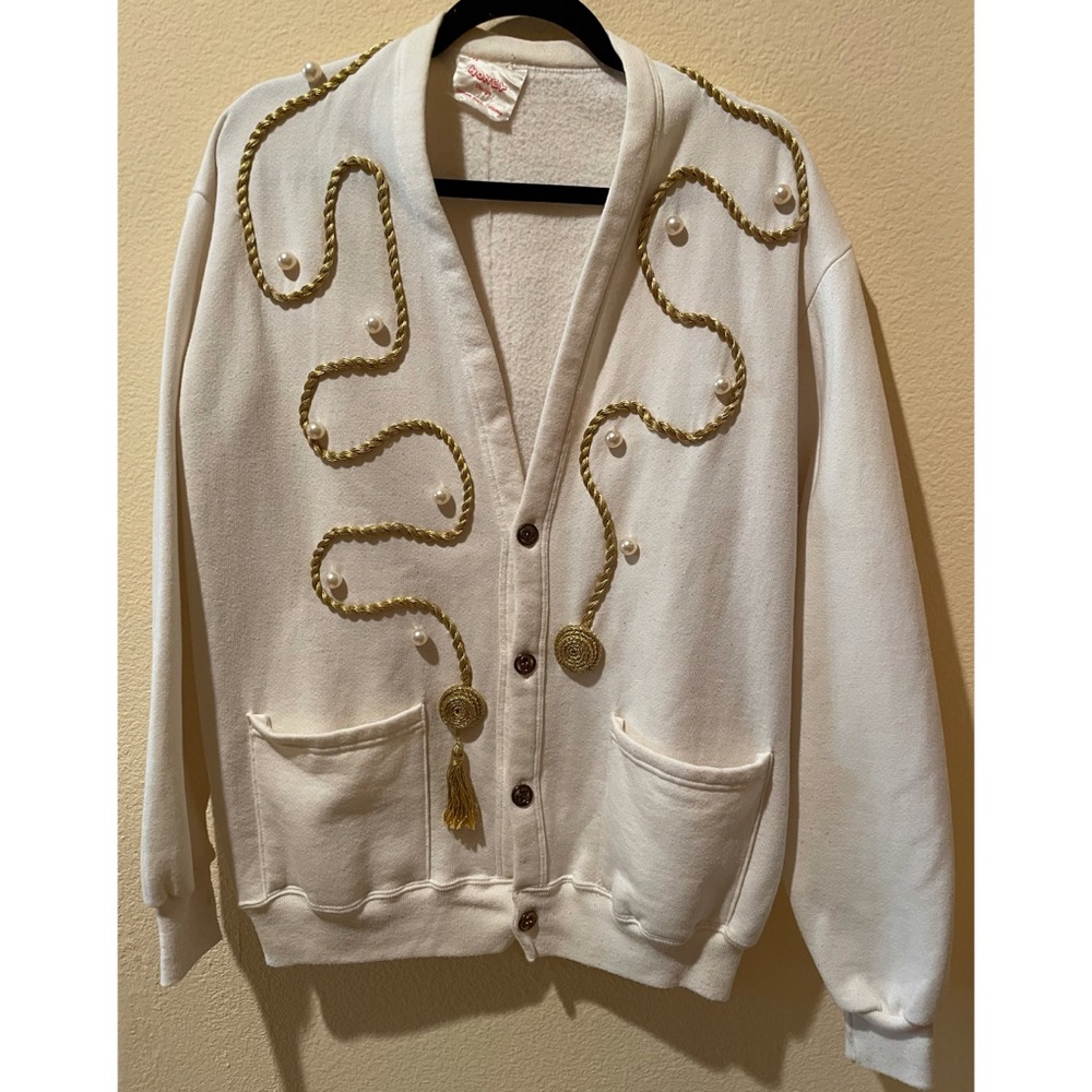 It’s a Honey Design vintage sweatshirt cardigan